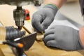 Carpenter with ruler measuring board at workshop Royalty Free Stock Photo