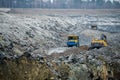 Production Mining of granite stone by quarrying machines in Mikashevichi Royalty Free Stock Photo