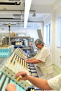 Production of pralines in a factory for the food industry - women working on the assembly line Royalty Free Stock Photo