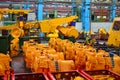 Production process of heavy mining trucks at the factory. Dump truck on the Industrial conveyor in the workshop of an automobile Royalty Free Stock Photo