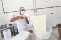 Production of traditional artisanal buffalo cheese mozzarella, in Itanhandu, countryside of Minas Gerais state, Brazil