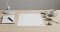 Productive Minimalist Workspace with Blank A3 Paper, Design Notebook, Coffee, and Lavender Royalty Free Stock Photo