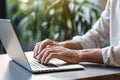 Productivity in Style: Businessman Typing on Laptop in Modern Office, close up hands