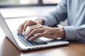 Productivity in Style: Businessman Typing on Laptop in Modern Office, close up hands