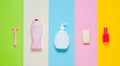 Products for the care of body, hair and personal hygiene on a multi-colored paper background. A bottle of fragrant perfume, lotion