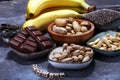 Products containing magnesium: bananas, pumpkin seeds, cashew nu Royalty Free Stock Photo