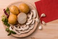 Products for cooking, mushrooms, potatoes, onions, garlic, herbs Royalty Free Stock Photo