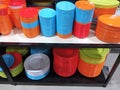 Colorful melamine plates on supermarket shelves