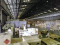 Products in a large warehouse.Within a large old warehouse