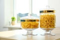 Products in modern kitchen glass containers on table Royalty Free Stock Photo