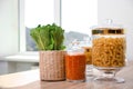 Products in modern kitchen glass containers on table Royalty Free Stock Photo