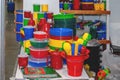 Products from plastic ware, objects take care of plants on a supermarket showcase. Replacing disposable tableware Royalty Free Stock Photo