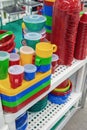 The products of plastic ware, subjects of care of plants on display in a supermarket. Replacement of disposable tableware