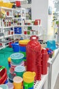 The products of plastic ware, subjects of care of plants on display in a supermarket. Replacement of disposable tableware