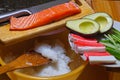 Do it yourself. Products for sushi: rice, salmon, surimi crab sticks, nori kelp, cucumbers and avocado