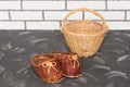 Products wicker made of natural vine. Decorative basket and slippers for home interior. Hand made, selective focus Royalty Free Stock Photo