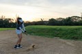 Profession asian Golfer woman hitting out of a sand trap. People with the golf course is on the sand.  Hobby in holiday and vacati Royalty Free Stock Photo