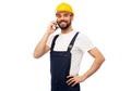 Happy male worker or builder calling on smartphone