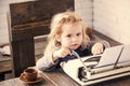 Profession of a copywriter. business kid or small boy or businessman child with typewriter