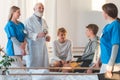 Doctors and helpful nurses with patients trying to find diagnose Royalty Free Stock Photo