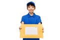 happy delivery woman holding parcel envelope Royalty Free Stock Photo