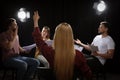 Professional actors reading their scripts during rehearsal Royalty Free Stock Photo