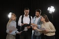 Professional actors reading their scripts during rehearsal in theatre Royalty Free Stock Photo