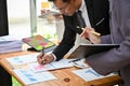 Professional adult Asian businessman checking and reviewing financial report Royalty Free Stock Photo