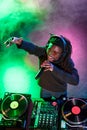 professional african american club DJ in headphones with microphone Royalty Free Stock Photo