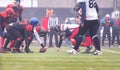 Professional american football players ready to start Royalty Free Stock Photo