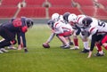 Professional american football players ready to start Royalty Free Stock Photo