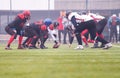 Professional american football players ready to start Royalty Free Stock Photo