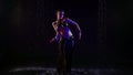 professional arabic dance performer is dancing under rain, mysterious female figure