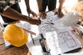 professional architect designer structural engineer team colleagues working office. Architects discussing at the table Royalty Free Stock Photo