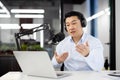 Professional asian male podcaster recording live show in studio Royalty Free Stock Photo