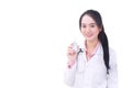 Professional Asian young smiling female doctor is standing holding spray of alcohol Beside the window in office to spray Royalty Free Stock Photo