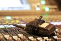 Professional audio Mixer and Professional Headphones in the Recording Studio. Sound Mixing Desk. Sound Mastering For Radio and TV Royalty Free Stock Photo