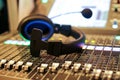 Professional audio Mixer and Professional Headphones in the Recording Studio. Sound Mixing Desk. Sound Mastering For Radio and TV Royalty Free Stock Photo