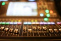 Professional audio Mixer and Professional Headphones in the Recording Studio. Sound Mixing Desk. Sound Mastering For Radio and TV
