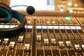 Professional audio Mixer and Professional Headphones in the Recording Studio. Sound Mixing Desk. Sound Mastering For Radio and TV Royalty Free Stock Photo