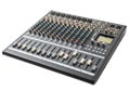 Professional audio mixing console with multiple knobs and sliders on a clean white background Royalty Free Stock Photo