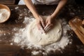 Professional baker hands kneading dough
