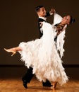 Professional ballroom dance couple preform an exhi