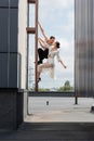 Professional ballroom dancers looking at each