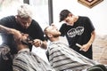 Professional barber who cuts beard and hair