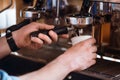 Professional barista making coffee Royalty Free Stock Photo