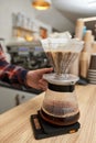 Professional barista man making coffee using filter Royalty Free Stock Photo