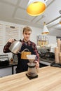 Professional barista man making coffee using filter Royalty Free Stock Photo