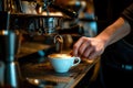 Professional barista using coffee machine making coffee in cafe Royalty Free Stock Photo