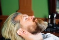 Professional beard care. Hairdresser. Barbershop procedures. Salon for men. Barber-shop.